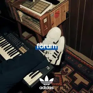 Campaign artwork, Adidas Forum trainers beside a keyboard and record player